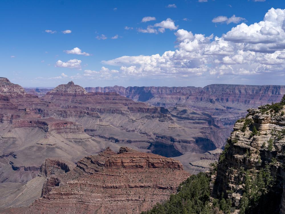 Clouds pass over the South Rim of Grand Canyon National Park in Grand Canyon Village, Ariz., Tuesday, Aug. 8, 2023. 