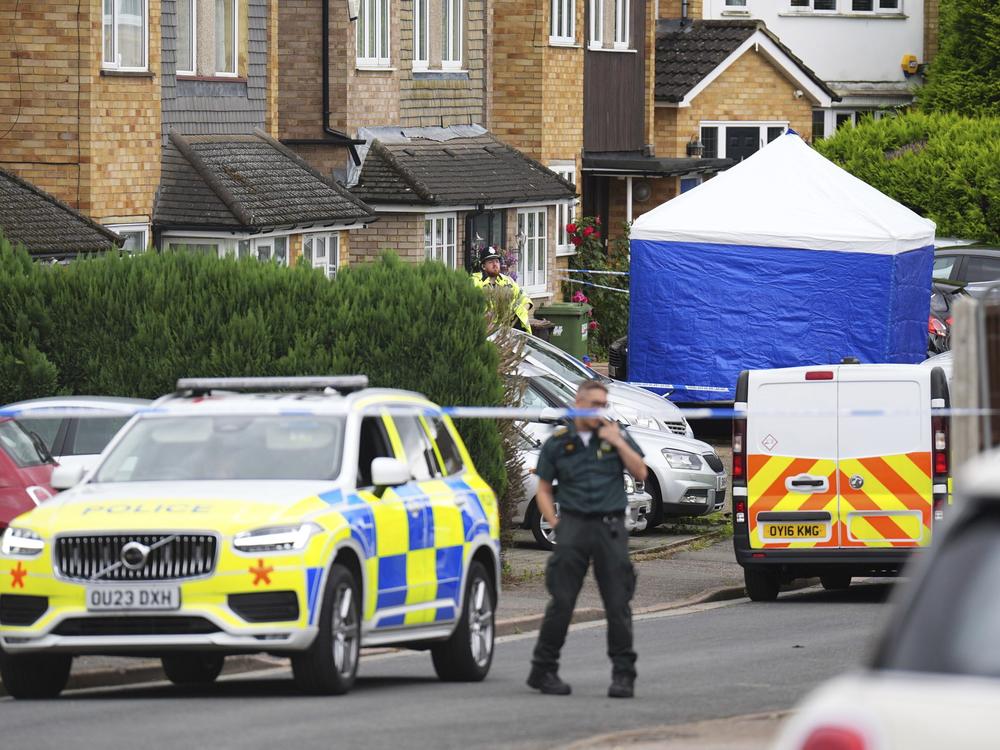 Police and emergency services at the scene in Ashlyn Close, Bushey, north of London, on Wednesday.