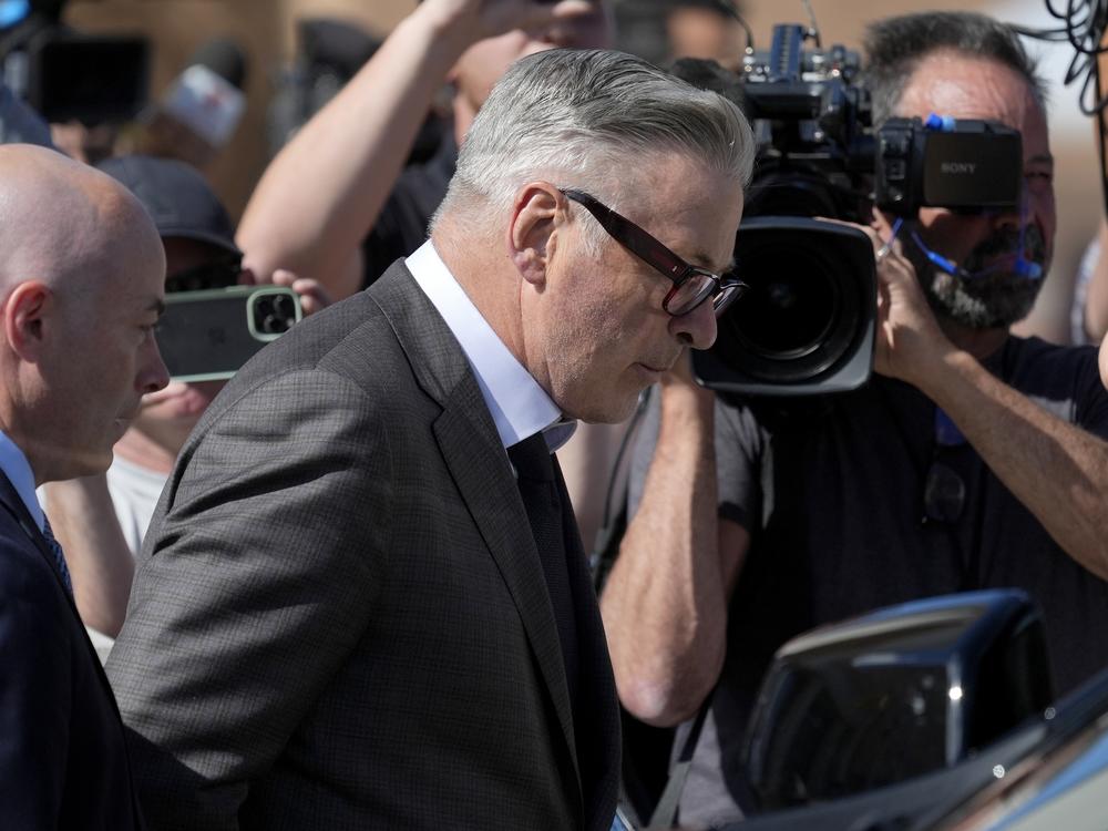 Actor Alec Baldwin leaves court after jury selection on Tuesday. Baldwin's wife, Hilaria, and his brother, actor Stephen Baldwin, were with him in the courtroom. 