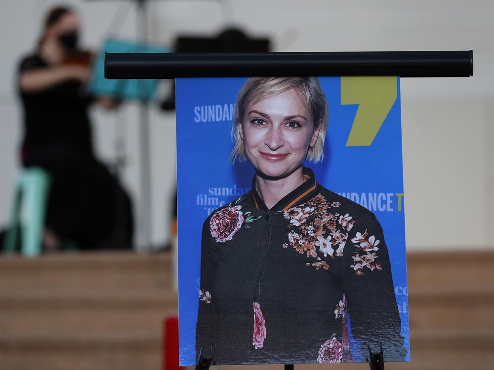 A photograph of cinematographer Halyna Hutchins on display during a vigil in her honor in Albuquerque, N.M., in October 2021. 