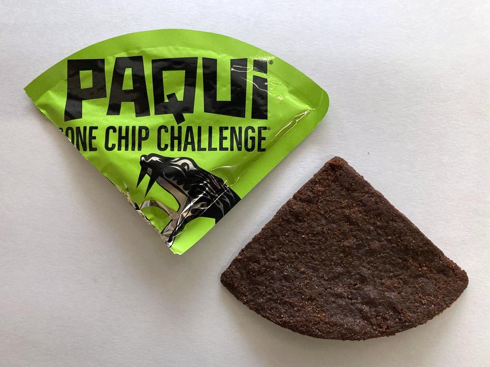 A Paqui One Chip Challenge chip is displayed in Boston on Sept. 8, 2023.