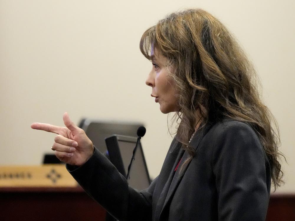 Attorney Erlinda O. Johnson made opening statements on behalf of the prosecution team. 