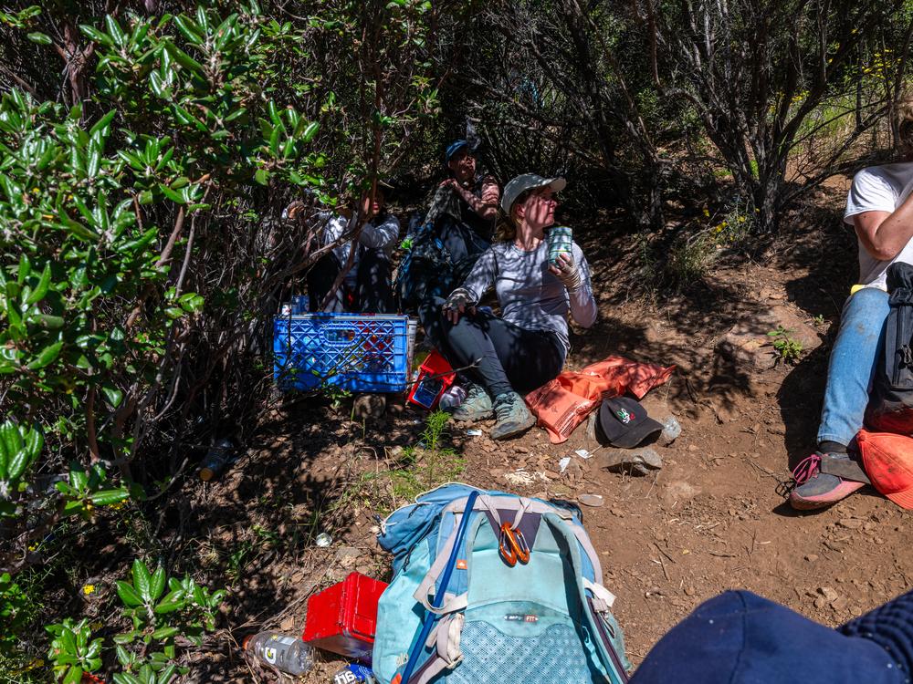 Volunteers with Border Relief Collective provide water and first aid to migrants who were unprepared for extreme summer temperatures along this part of the U.S.-Mexico border. 