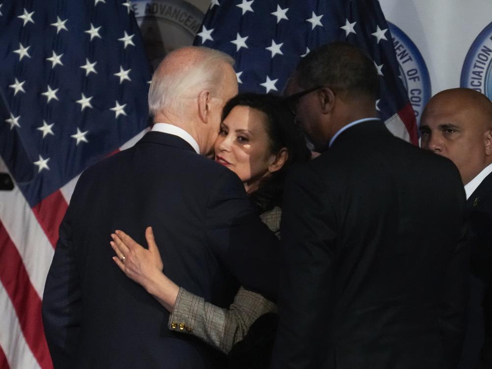 President Biden hugs Democratic Gov. Gretchen Whitmer at the NAACP Detroit branch Fight for Freedom Fund dinner in Detroit on May 19, 2024.