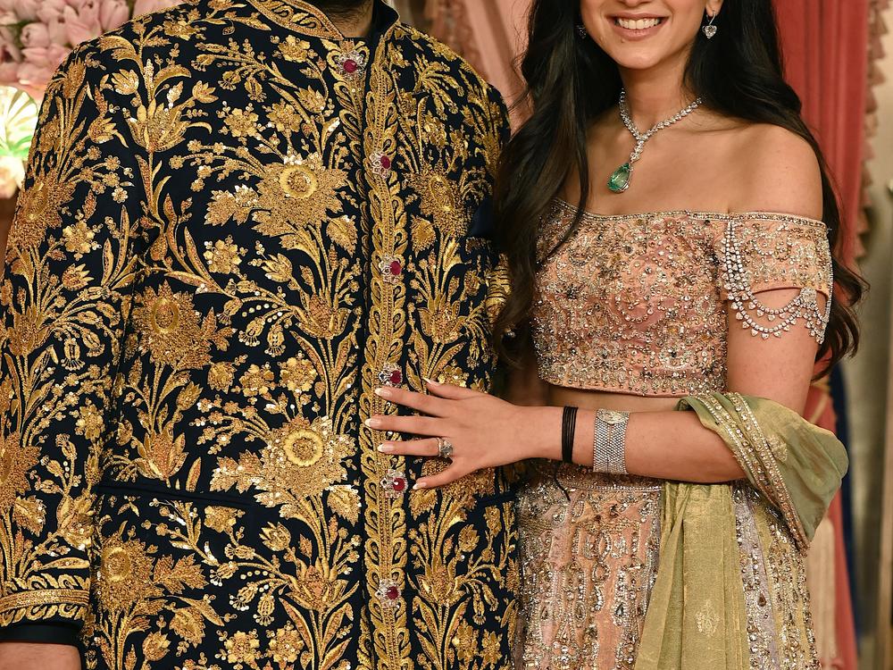 Anant Ambani and his fiancée Radhika Merchant pose for a picture during their Sangeet ceremony in Mumbai, on July 5.