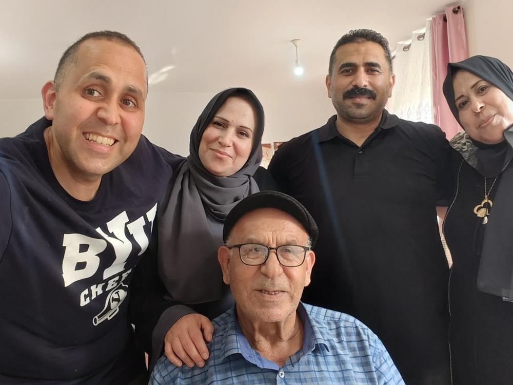 Hani Almadhoun takes a selfie with his siblings, Samah, Mohamed and Faten, and their father, Omar, in Gaza in July 2023 when he last visited.