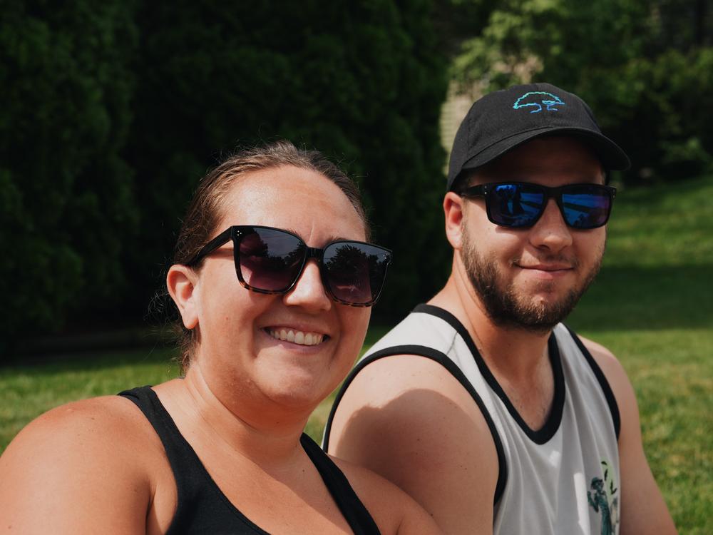 Kayla and Ben Gulland watches the annual Lions Daze parade on Sunday morning in Sussex in Waukesha County.
