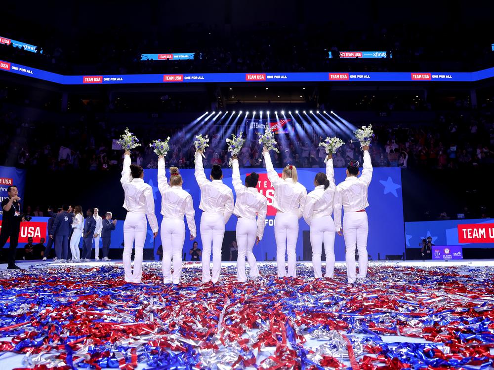 From left, Hezly Rivera, Joscelyn Roberson, Suni Lee, Simone Biles, Jade Carey, Jordan Chiles and Leanne Wong pose after being selected for the 2024 U.S. Olympic Women's Gymnastics Team on Day Four of the 2024 U.S. Olympic Team Gymnastics Trials in Minneapolis.