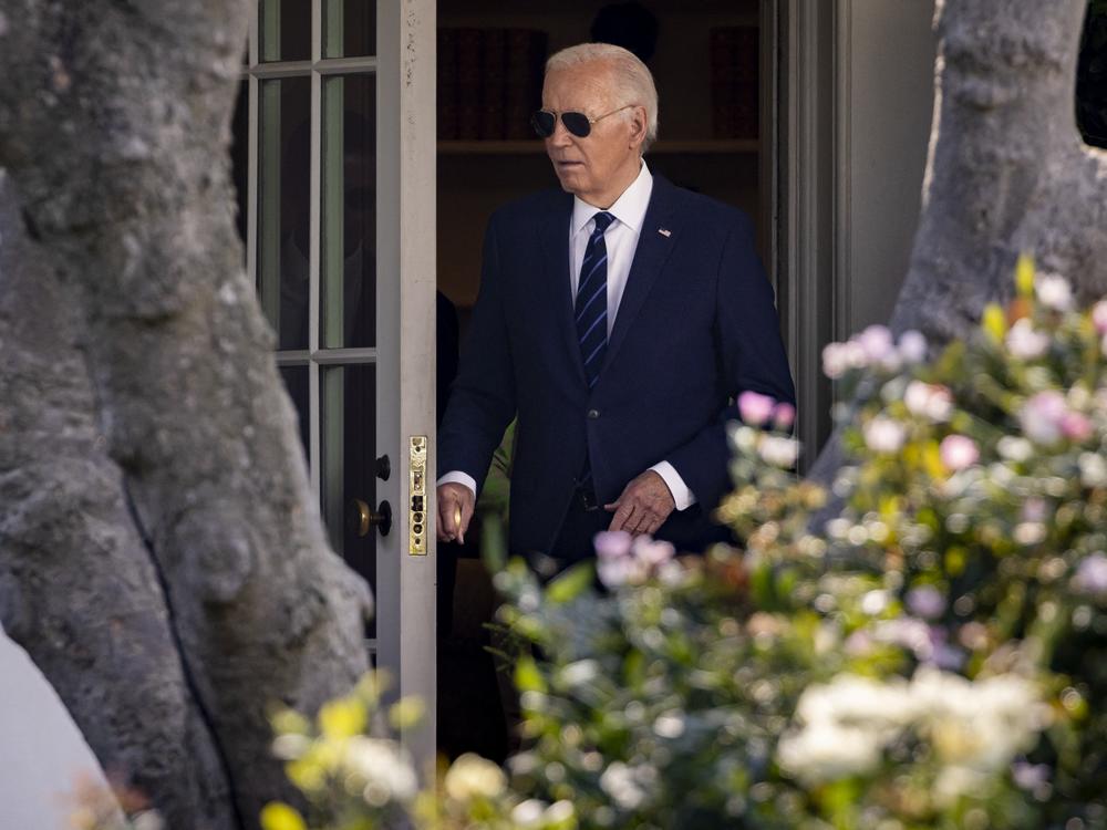 President Biden walks out of the Oval Office towards the South Lawn of the White House on July 15 as he left to campaign in Las Vegas.