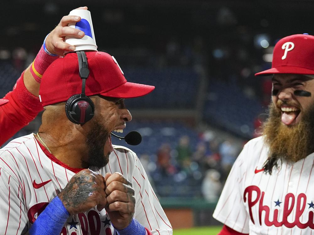Edmundo Sosa and Phillies teammate Brandon Marsh after a game against the New York Mets in May.