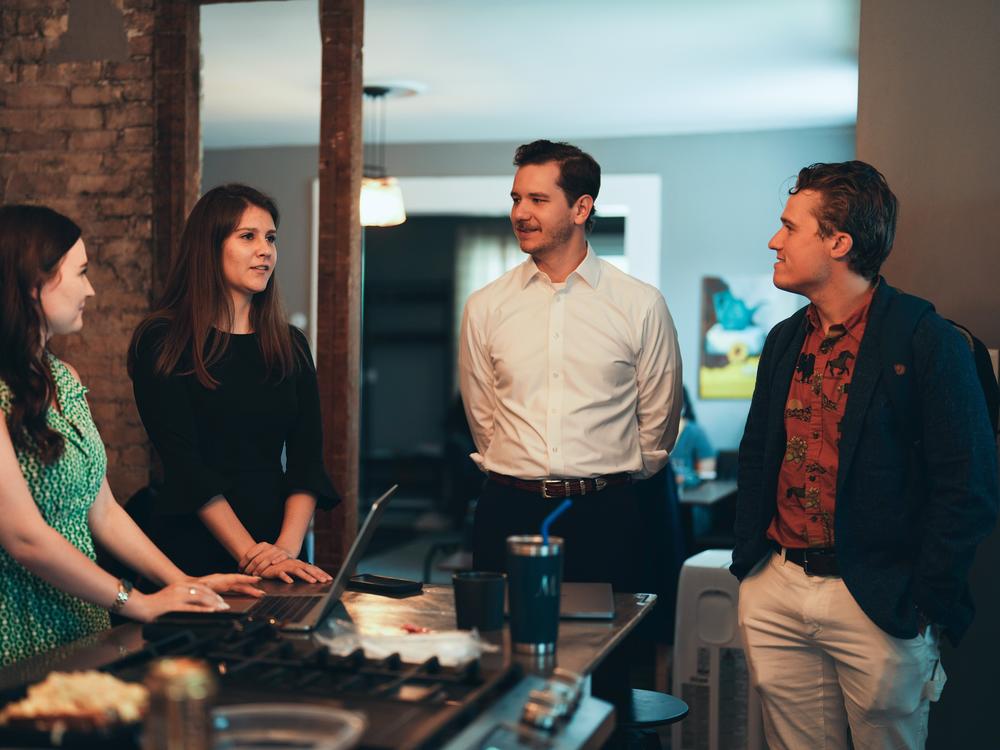 Left to right: Danielle Butcher Franz, Karly Matthews, Stephen Perkins and Benji Backer talking about plans for the second day of the Republican National Convention in Milwaukee, Wisconsin.