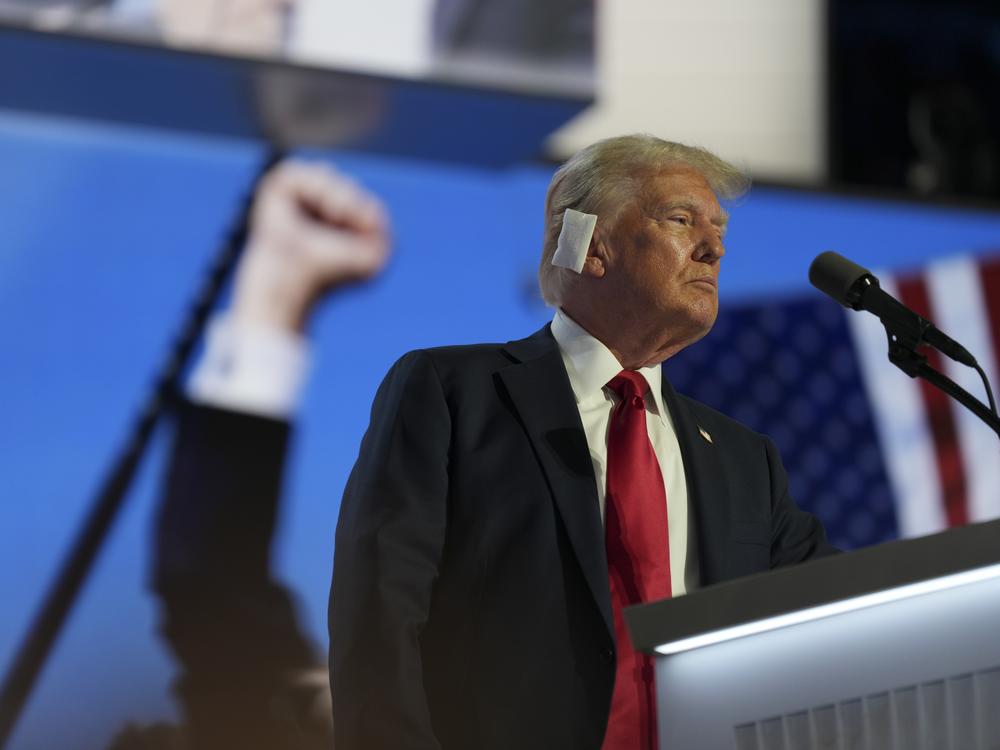 Republican presidential candidate Donald Trump speaks about the attempted assasination during his party's acceptance speech at the RNC.