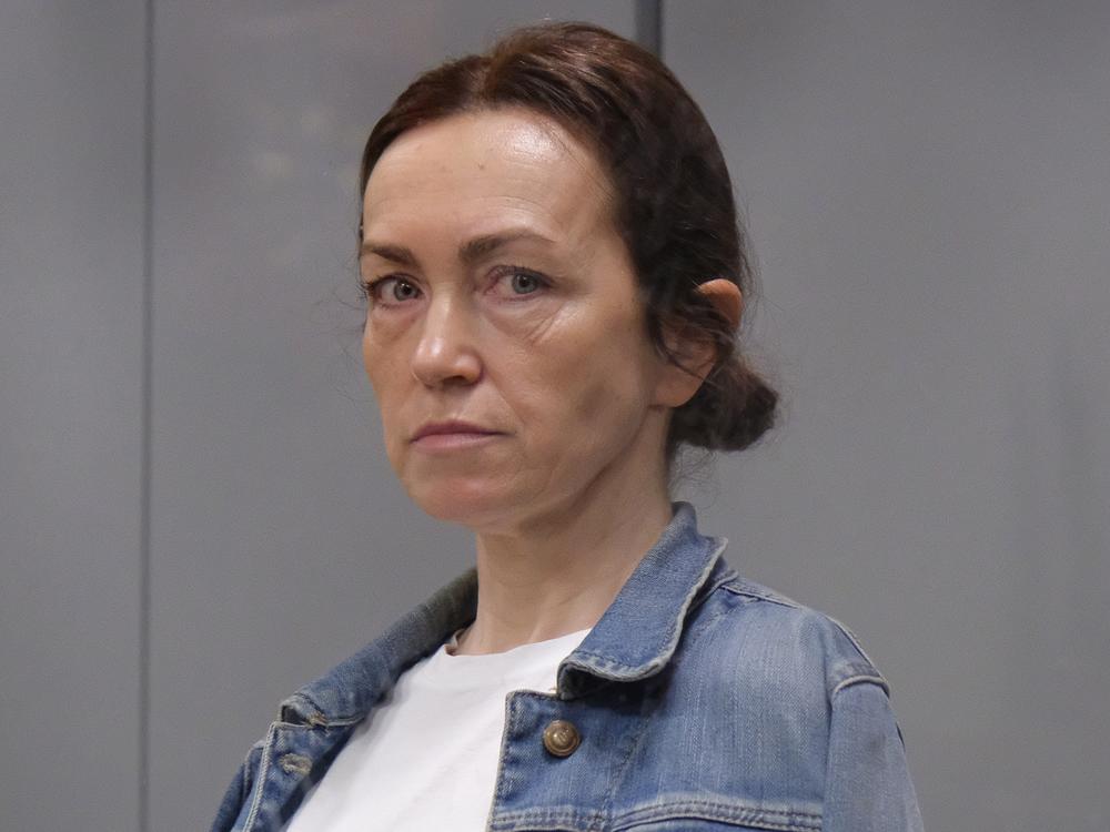 Alsu Kurmasheva, an editor for the U.S. government-funded Radio Free Europe/Radio Liberty's Tatar-Bashkir service, attends a court hearing in Kazan, Russia, in May. A Russian court has convicted Kurmasheva of spreading false information about the Russian army and sentenced her to 6½ years in prison after a secret trial, court records and officials said on Monday. 