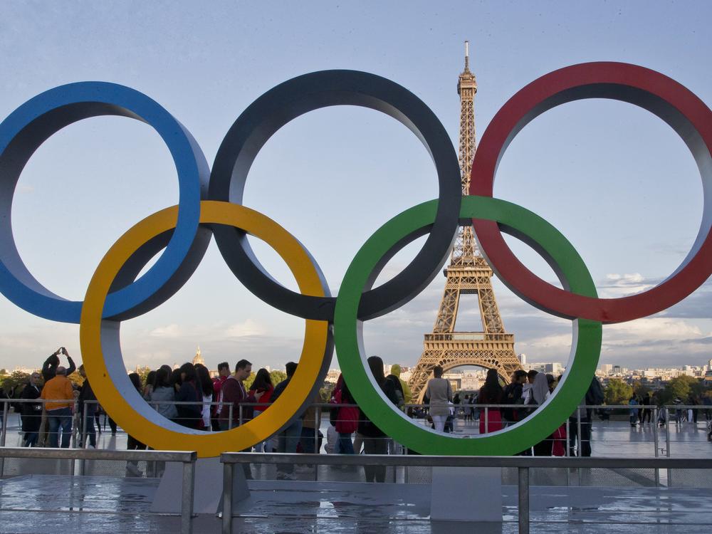 The Olympic rings are seen at Trocadero Plaza, the site of the opening ceremony's finale celebrations, overlooking the Eiffel Tower in Paris.