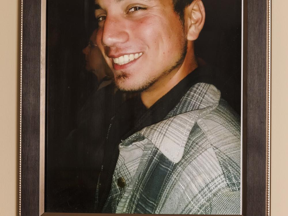 A photo of Nathan Fryday hangs on the wall of his family’s home in Laurel Hill, Fla.