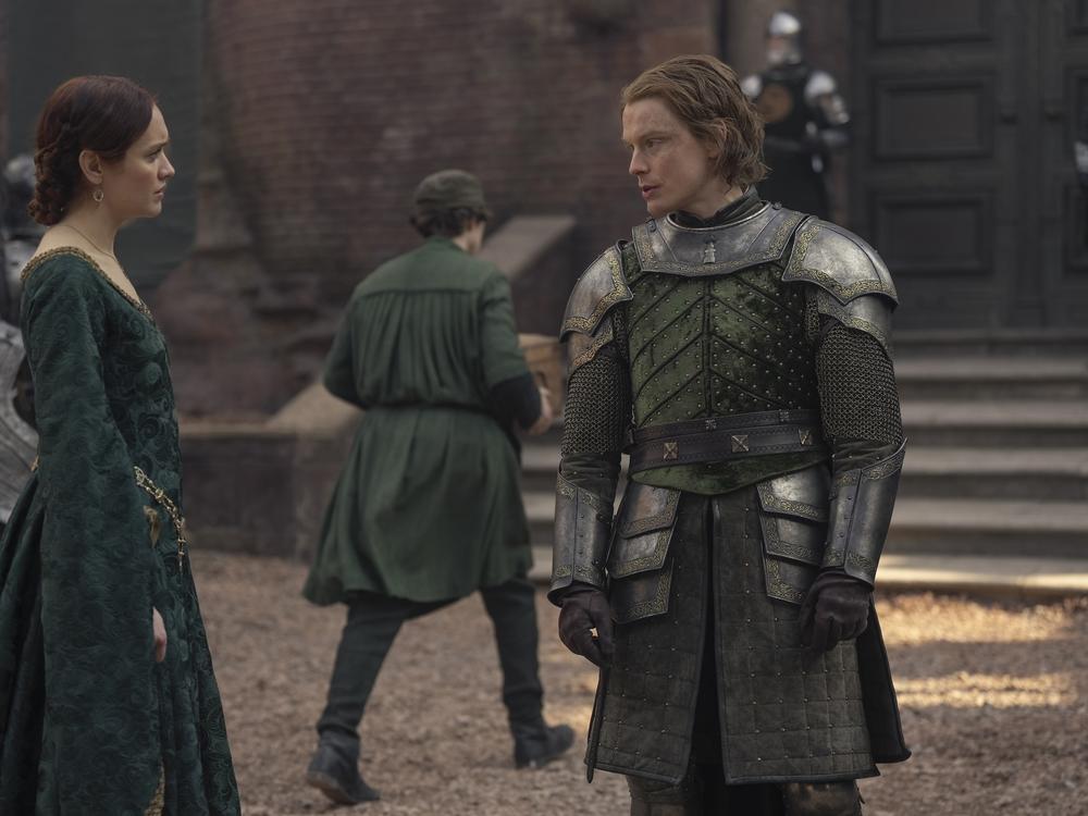 Alicent (Olivia Cooke) asks her brother Gwayne (Freddie Fox) how she can bring out her ginger highlights like he does.                        