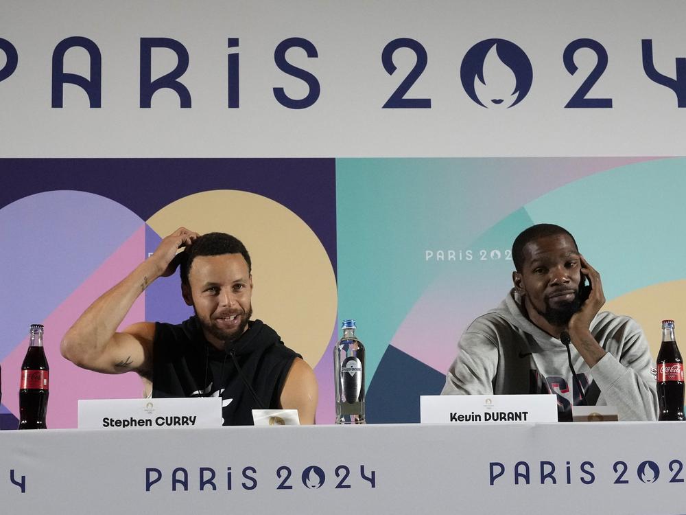 United States men's basketball teammates Kevin Durant, right, and Stephen Curry attend a press conference at the 2024 Summer Olympics on Thursday, in Paris.