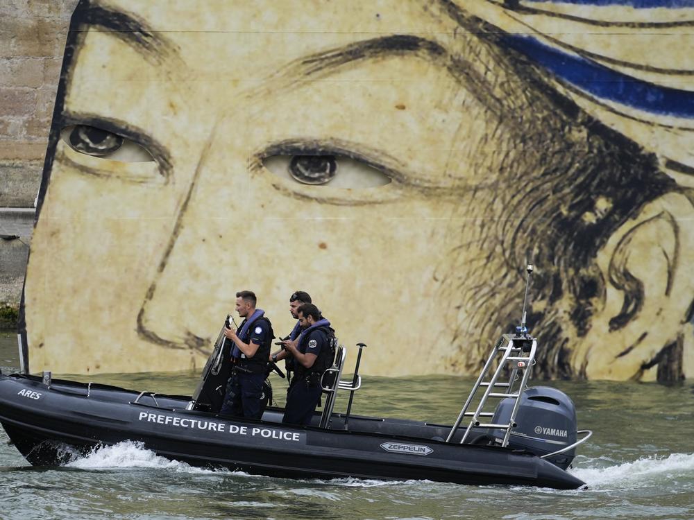 Security patrol by boat in Paris, France, before the opening ceremony.