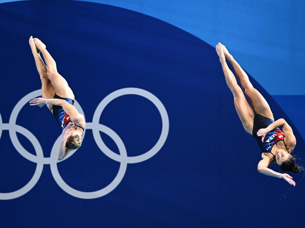 Kassidy Cook and Sarah Bacon of the U.S. compete in the women's synchronized 3-meter springboard diving final at the Paris 2024 Olympic Games at the Aquatics Centre in Saint-Denis, north of Paris, on Saturday. They won silver, the first U.S. medal in the event since 2012.