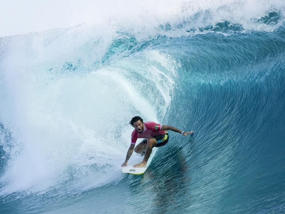 Filipe Toledo, of Brazil, surfs during the second round of the 2024 Summer Olympics surfing competition on Sunday.