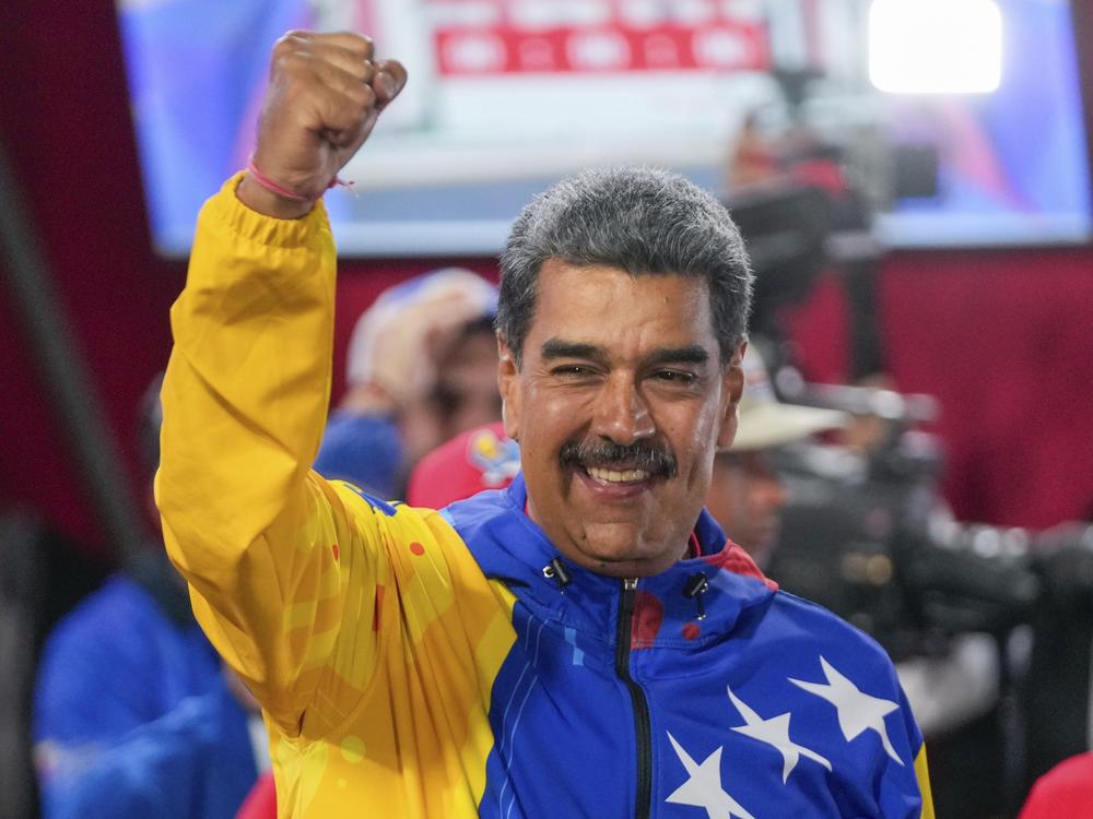 President Nicolas Maduro addresses supporters after electoral authorities declared him the winner of the presidential election in Caracas, Venezuela on Monday. 