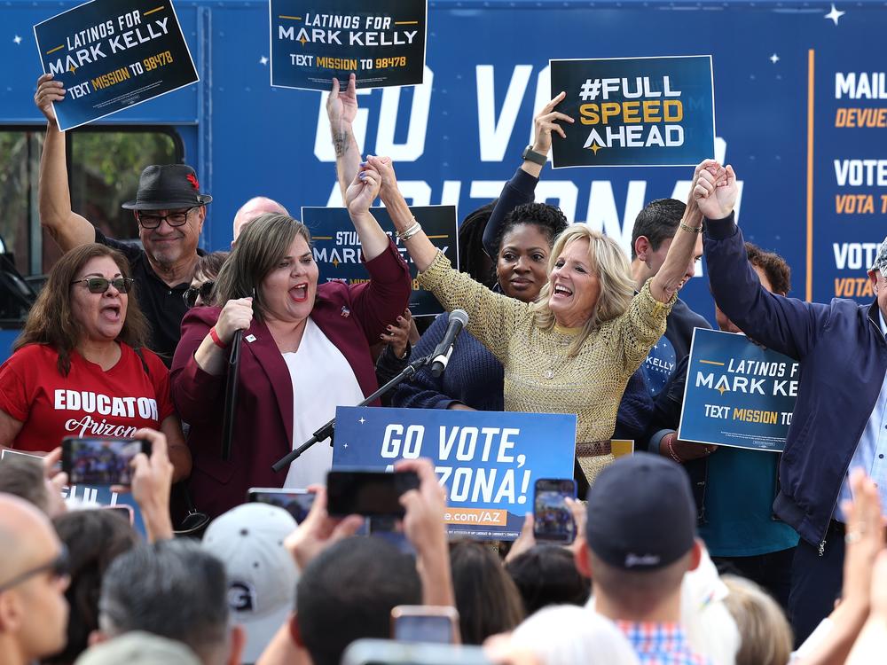 U.S. House candidate Raquel Terán, left, is seen here during a campaign event in 2022 in Tucson, Ariz., with First Lady Jill Biden and then-Senate candidate Sen. Mark Kelly (D-Ariz.).