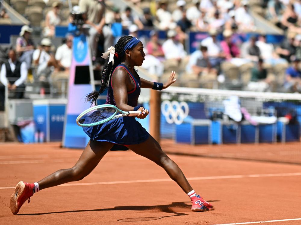 Coco Gauff hits a return shot to Croatia's Donna Vekic during their third-round tennis match on Court Philippe-Chatrier at the Roland-Garros Stadium during the Paris 2024 Olympic Games. 