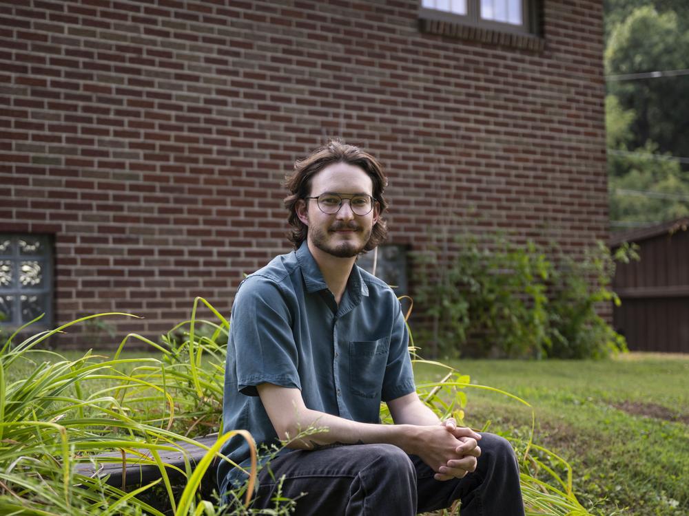 Jimmy Madonna, 25, of Pittsburgh, poses for a portrait following a dinner with family in South Heights, Pennsylvania on July 23, 2024.