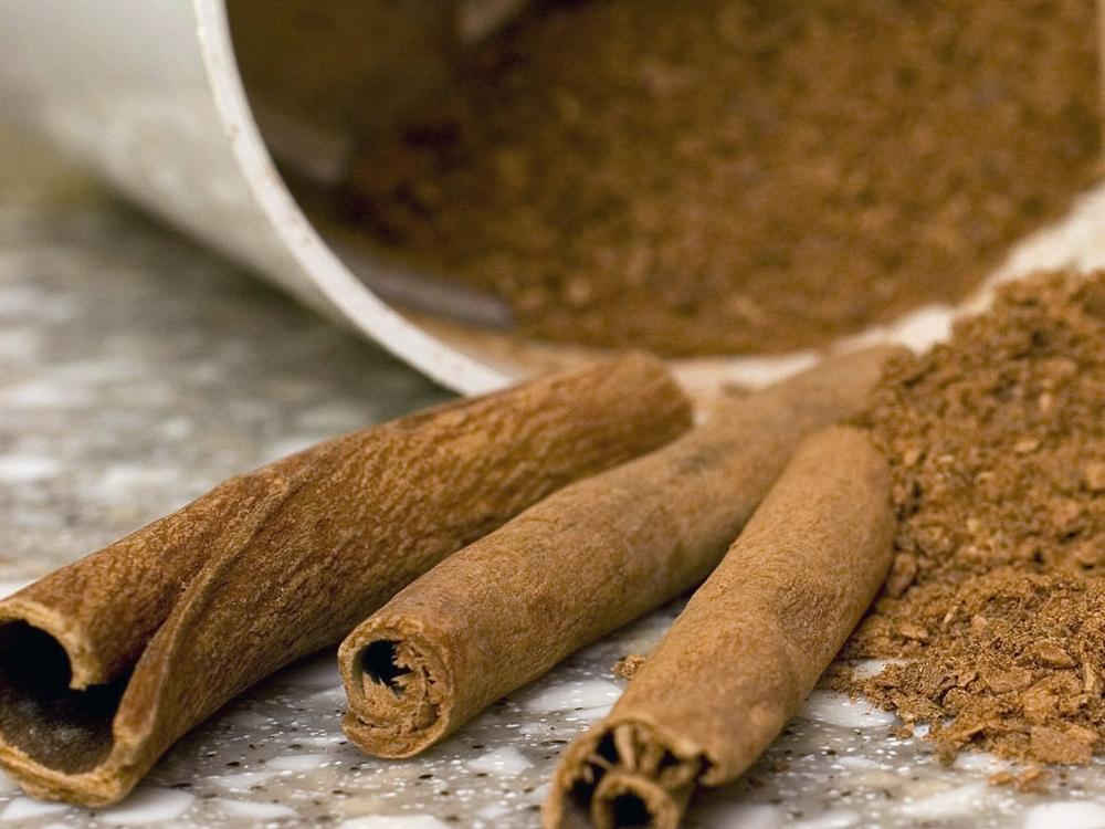 Stick and ground cinnamon is displayed for a photograph in Concord, N.H., on March 2, 2008. 