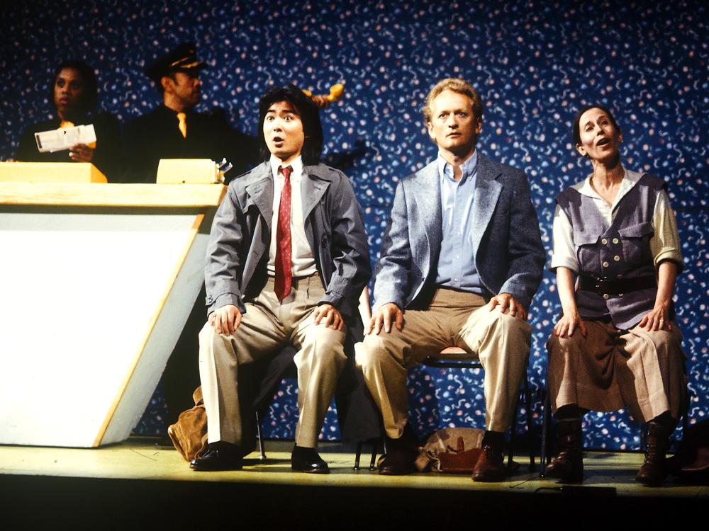 Monk performs in the airport scene from her opera <em>ATLAS</em> with, left to right, Allison Easter, Ching Gonzalez, Chen Shi-Zheng and Robert Een at the Odeon theater in Paris in 1991.