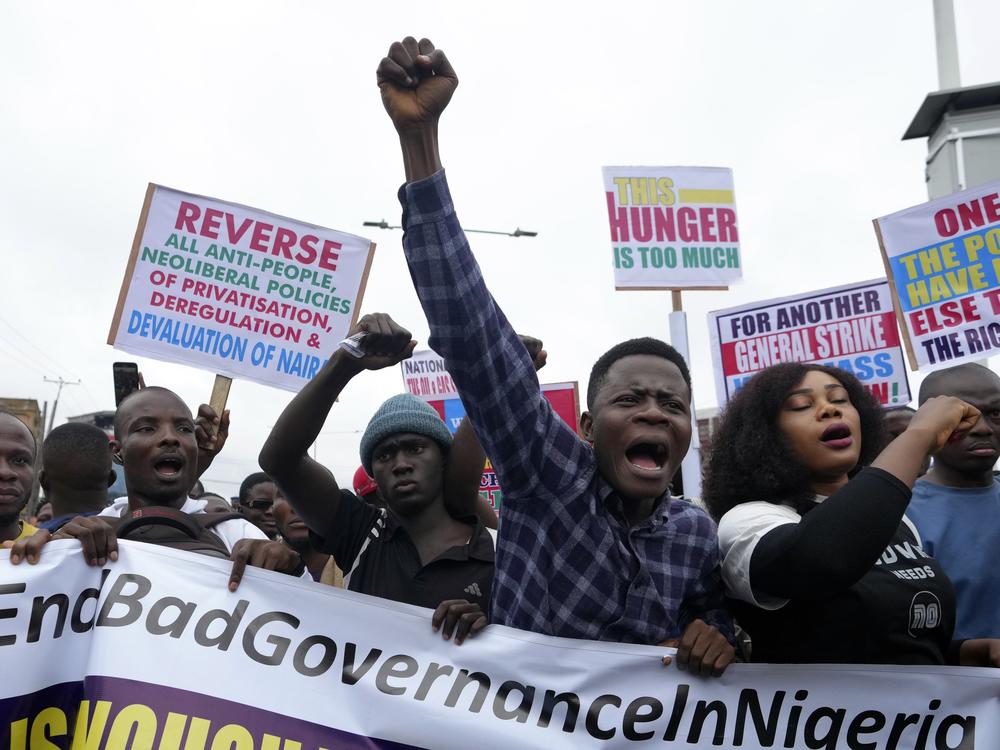 People protest against hardship on the street of Lagos, Nigeria, Thursday, Aug. 1, 2024. Thousands of mostly young people poured onto the streets across Nigeria on Thursday as they protested against the country's worst cost of living crisis in a generation. Security forces fired tear gas to disperse some of the protesters in the capital, Abuja. 