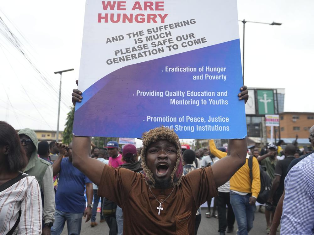A man protest against the country’s worst cost-of-living crisis in Lagos, Nigeria, Thursday, Aug. 1, 2024. 