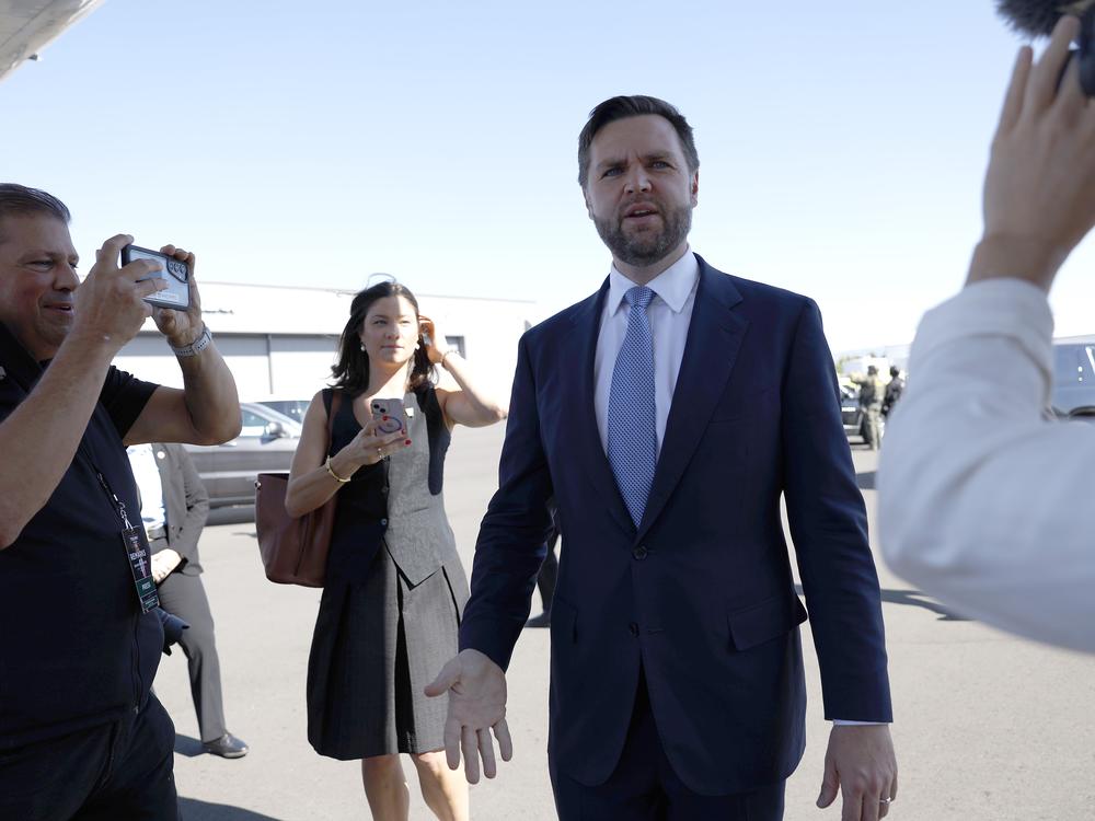 Republican vice presidential nominee U.S. Sen. JD Vance (R-OH) speaks with reporters after walking off “Trump Force 2” at Reno-Tahoe International Airport on July 30, 2024 in Reno, Nevada. Vance is the subject of a joke that went viral on social media last week, highlighting the challenges of sorting fact from fiction in a contentious presidential election.