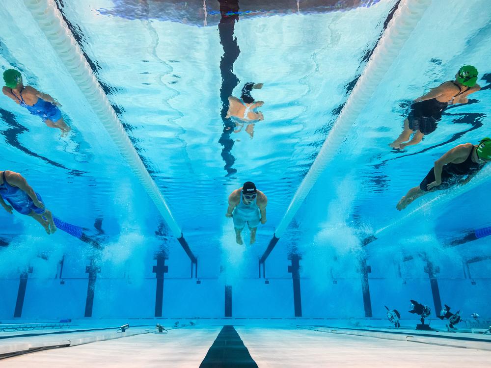 Is the depth of the Paris Olympics pool preventing world records from being broken? Here, an underwater view shows (from left) South Africa's Kaylene Corbett, Ireland's Mona McSharry and South Africa's Tatjana Smith competing in a heat of the women's 200m breaststroke swimming event during the Paris 2024 Olympic Games in Nanterre, west of Paris, on July 31.