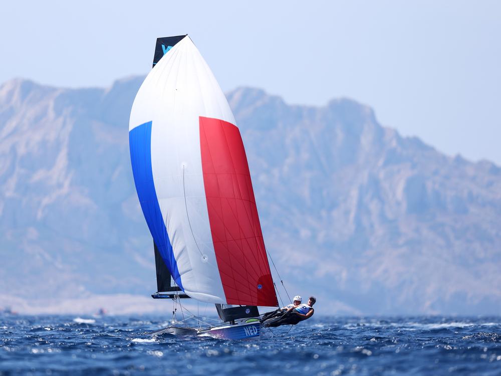 Odile van Aanholt and Annette Duetz of Team Netherlands sailed to gold in the women's skiff 49erFX class medal race on Friday, in a dramatic race that included a small detour.