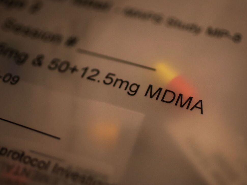 A drugmaker seeks FDA approval for MDMA, or ecstasy, used as a treatment for PTSD in conjunction with therapy.  Questions about the clinical trials cast doubt on its chances of FDA approval but supporters haven't given up.