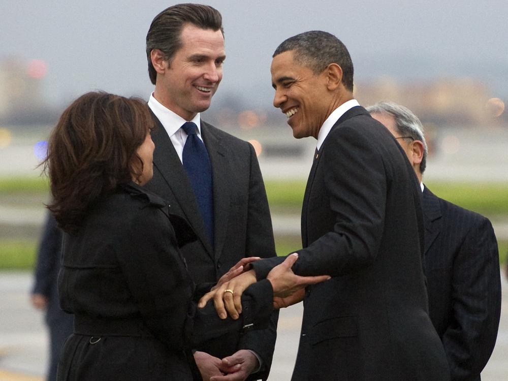 Barack Obama greets then-California Attorney General Kamala Harris in San Francisco in February 2011, as then-California Lt. Gov. Gavin Newsom, middle, watches.