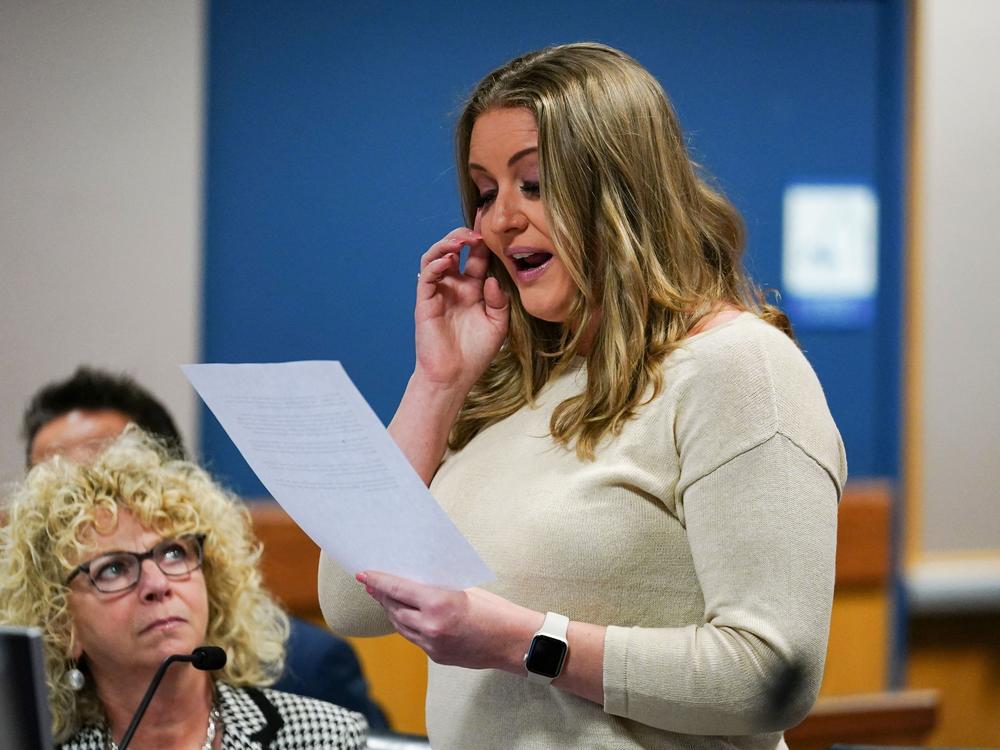 Former Trump attorney Jenna Ellis reads a statement after pleading guilty in Atlanta on Oct. 24, 2023, to one felony count of aiding and abetting false statements and writings in the Fulton County election subversion case.
