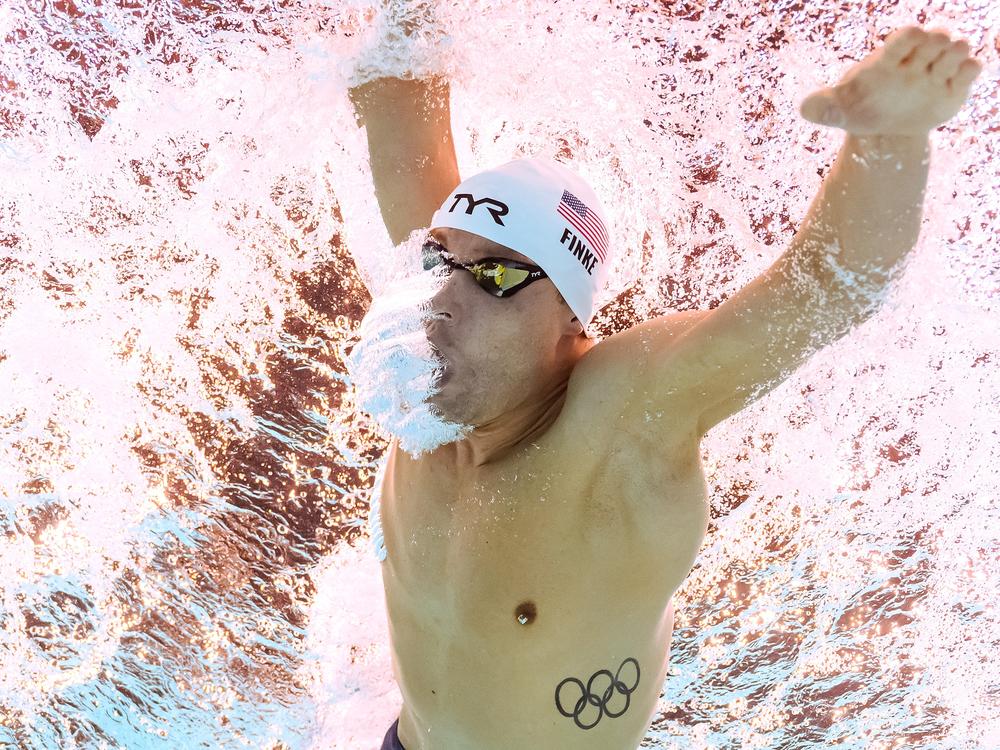 The USA's Bobby Finke won the 1,500-meter freestyle final at the Paris Olympics Sunday night, shattering a world record in the endurance race that had stood since 2012.