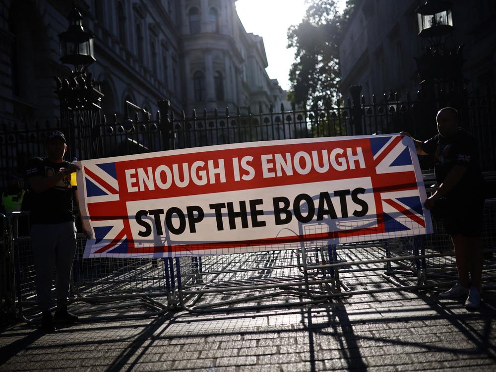Protestors held a banner reading 