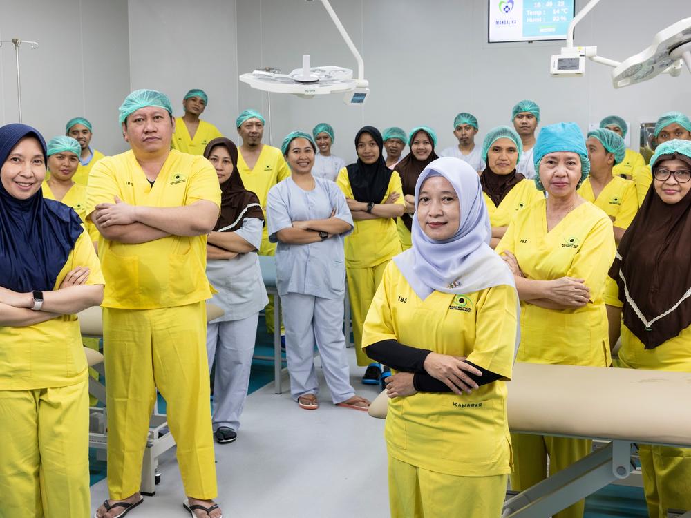This medical team performed cataract operations at a mass surgery event in Central Lombok, Indonesia. Dr. Sriana Wulansari, one of the subjects of the documentary, is in front, right. “The reward for me is the best visual acuity for the patient,” she says. “They can see, they can work, study and it makes me happy.”