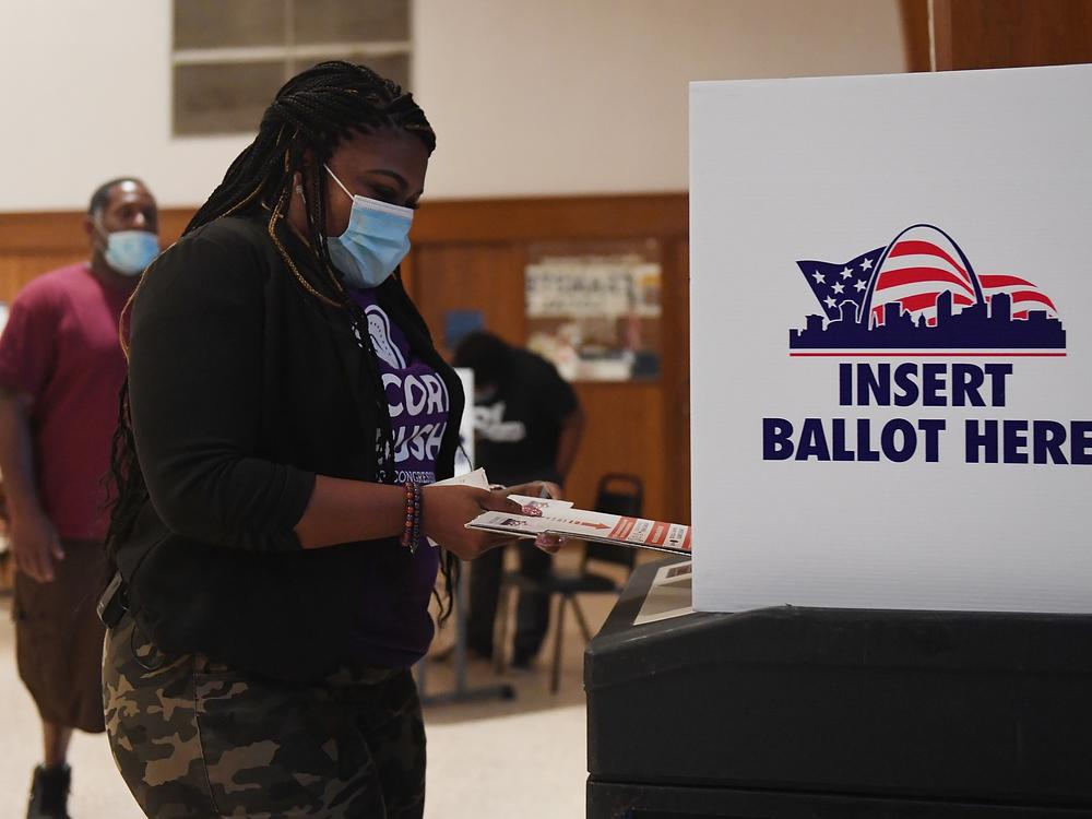 As a then Missouri Democratic congressional candidate Cori Bush casts her ballot on August 4, 2020 at Gambrinus Hall in St Louis.