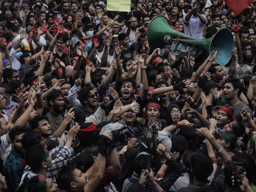 Activists take part in a protest as they demand justice for victims arrested and killed in the recent countrywide violence on August 2.