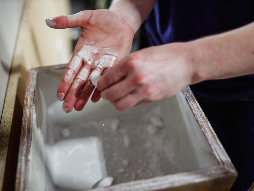 Reeves' chalked and calloused hands are a testament to her work ethic.