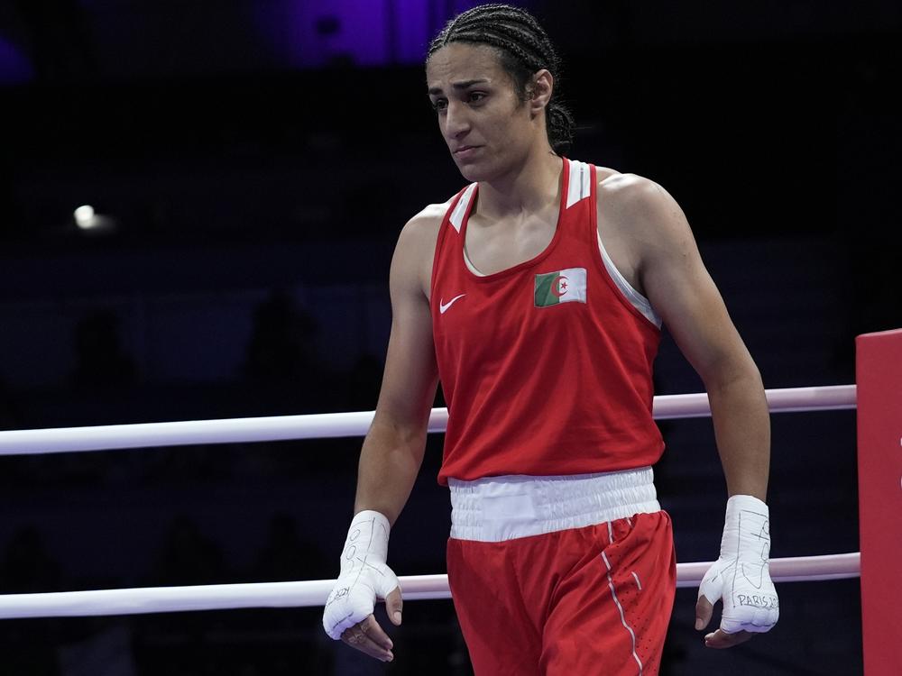 Algeria's Imane Khelif, reacts after defeating Italy's Angela Carini in their women's 66kg preliminary boxing match at the 2024 Summer Olympics, Thursday, in Paris.