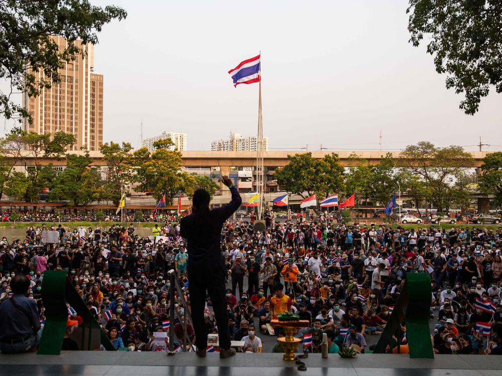 Thais protest against the government in February 2020 after Thailand's Constitutional Court ordered the dissolution of the Future Forward Party, finding the party guilty of violating election law by accepting a loan from its founder. Party supporters gathered despite concerns about COVID-19.