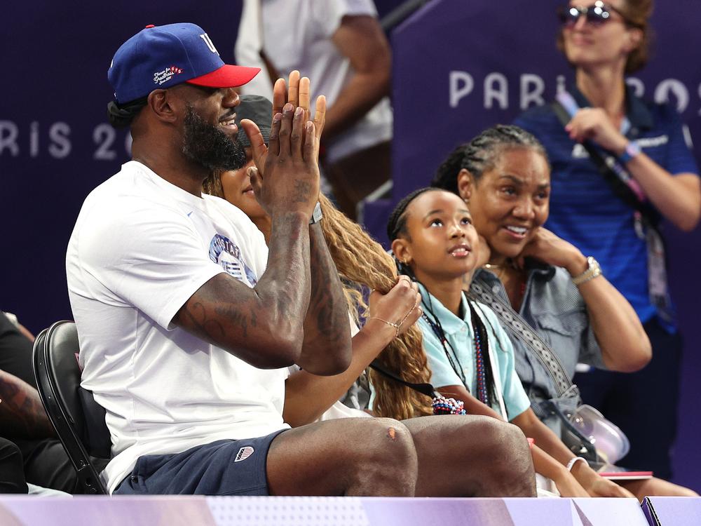 LeBron James cheers on fellow Team USA basketballers in the 3x3 women's game against Spain last week at Esplanade Des Invalides during the Paris Games.