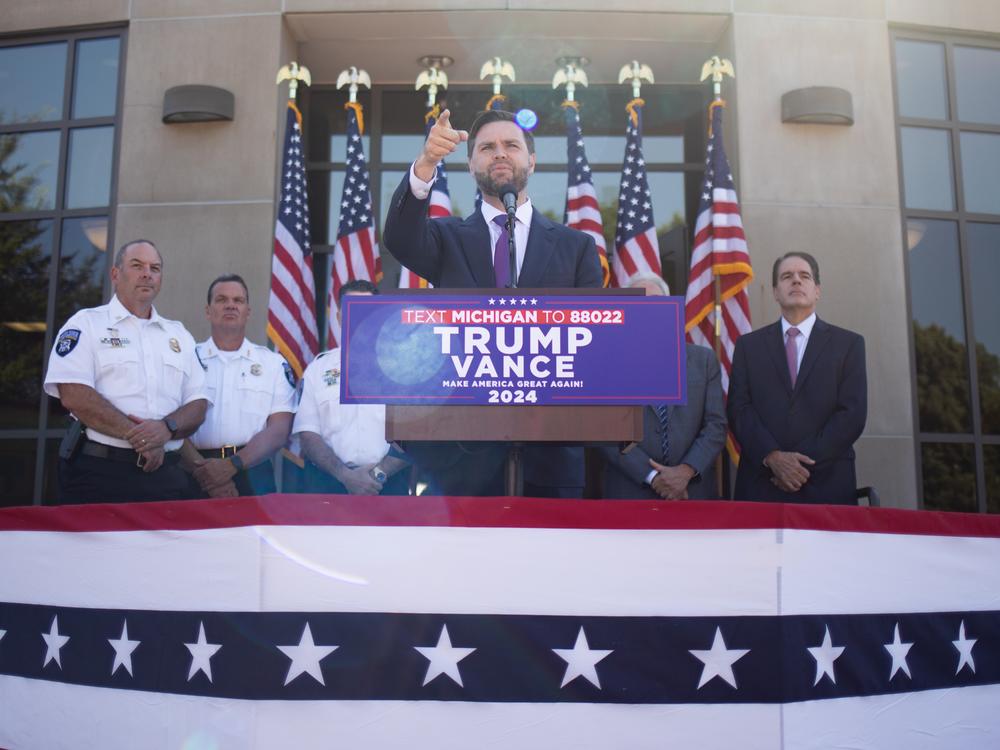 Republican vice presidential nominee JD Vance, a U.S. senator from Ohio, speaks during a press conference at the Shelby Township Police Department on Wednesday in Shelby, Mich.