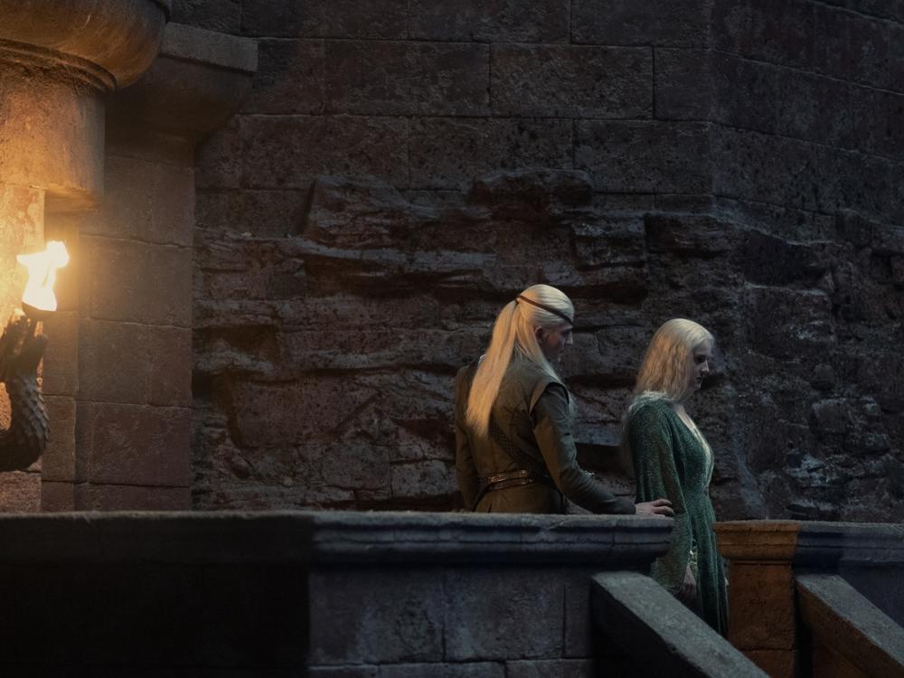 Aemond (Ewan Mitchell) and Helaena (Phia Saban) discuss hey wait never mind check out that cool sconce guys!             