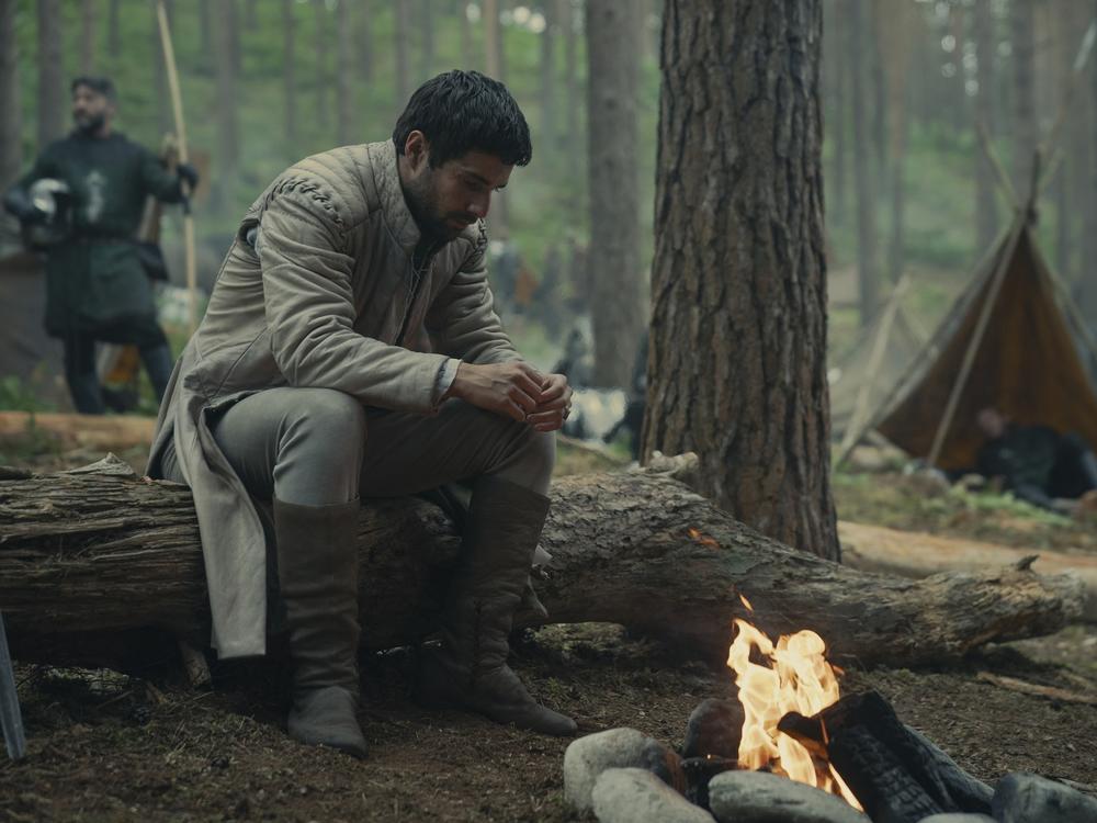 Criston Cole (Fabien Frankel) mopes like his s'more fell into the fire.
